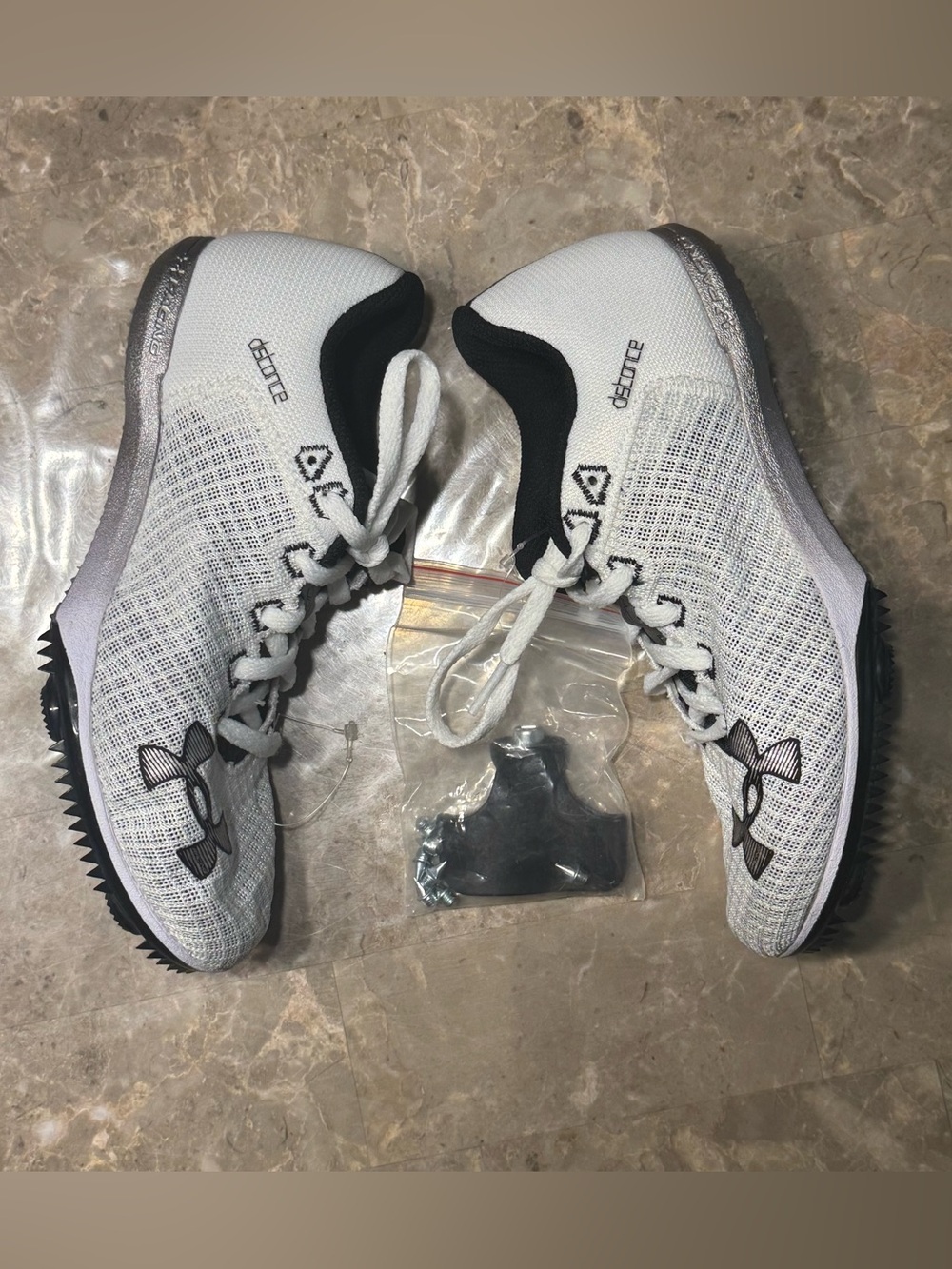 New Under Armour Kick Distance 4 track spikes
Men’s size 5
Women’s size 6.5